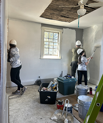 Volunteers for Central Westmoreland Habitat for Humanity work on finishing a home for a family in need in Westmoreland County.