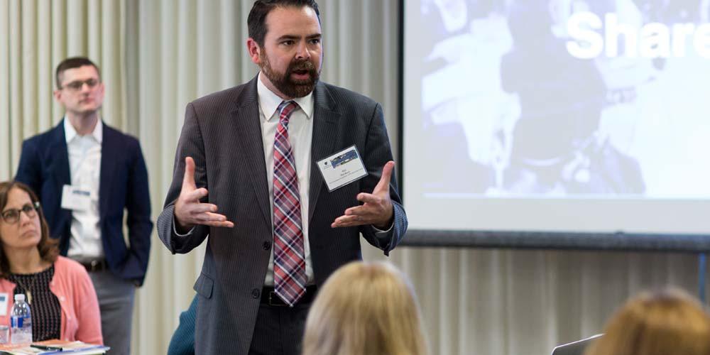 Phil Koch, Vice President of Policy & Community Impact, leads a donor education event at the Foundation.